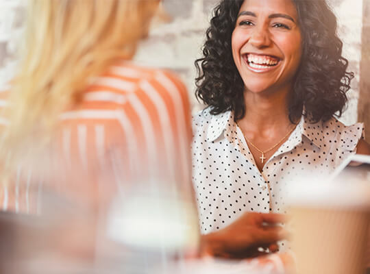 Woman smiling.