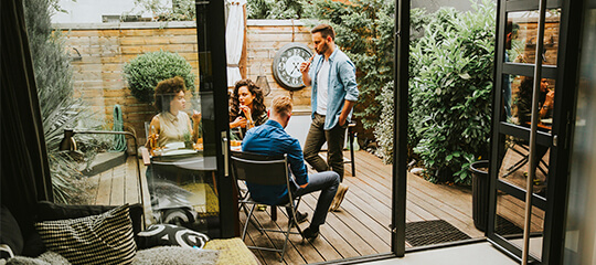 Friends together on a patio.