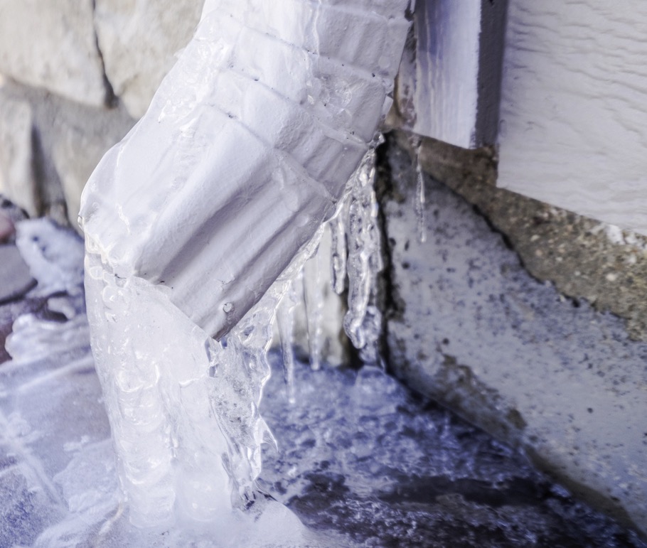 Frozen gutter down spout