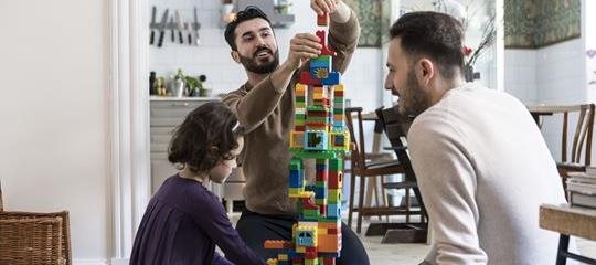 Family with building blocks.